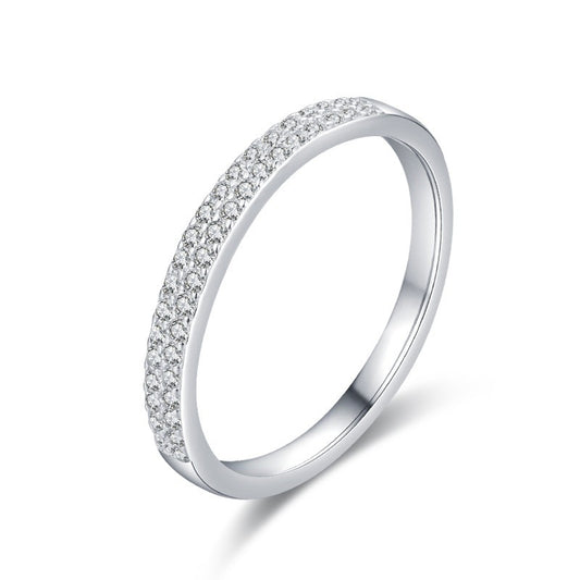 Silver ring with small diamonds on a white background